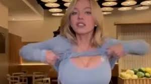 Sydney Sweeney pulls down her jumpsuit to show off new Syrn bra as fans tell her 'you look amazing!'