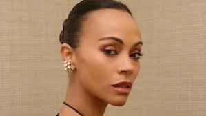 Zoe Saldaña in bold black bodysuit showcasing her style