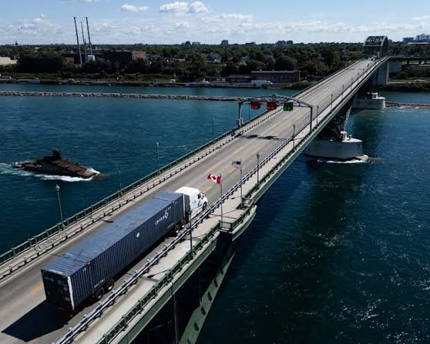 Trump pauses tariffs on Canadian imports, stating a deal is in place; Carney notes substantial progress but key work remains
