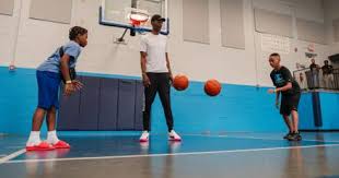 Basketball legend Ralph Sampson visits Lynchburg’s Boys & Girls Club