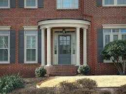 Image result for Traditional Front Door with exterior stone floors & Fence