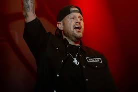 Jelly Roll performing on stage during his concert hiatus announcement