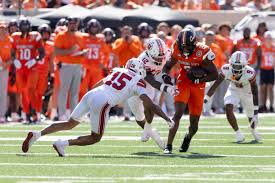 No. 12 Utah gets first Big 12 win, defeating No. 14 Oklahoma State with 
stifling defense