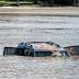 The Latest on storm: Governor takes aerial tour of floods