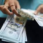 Shares rally, dollar eases Trump