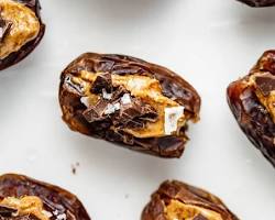 Image of Dates stuffed with almond butter snacks