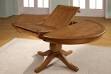 Solid oak round extending dining table