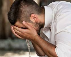 Image of Muslim performing ablution
