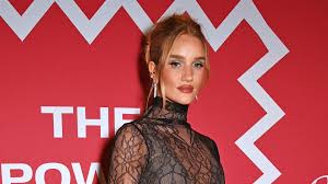 Rosie Huntington-Whiteley shares ultra-rare pool photo of daughter Isabella, 2, with amazing curls