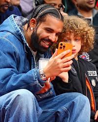 Drake | Drake & Adonis at the @raptors game 🙌🏽🔥 #drake | Instagram