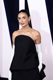 Demi Moore Nails Preppy Style in Micro Minidress