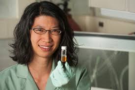 Geomicrobiologist Clara Chan holds a sample of iron-oxidizing bacteria in her lab. - Chan_Clara_Iron_Research_030
