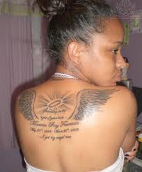 Angel Wings Memorial Tattoo &middot; Gre Ink Memorial Angel Wings Tattoo On Arm &middot; Memorial Footprints With Angel Wings Grey Ink Tattoo On Back ... - best-angel-wings-memorial-tattoo