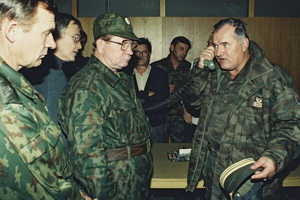 Ratko Mladic, ex-Bosnian Serb warlord who oversaw atrocities, dies as a prisoner at 84; Serbian TV reports death in The Hague