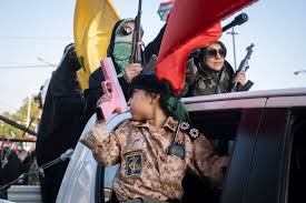 Guns on the television and in Iran’s streets as Trump renews war threats