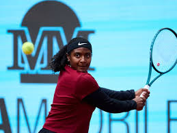 Baptiste through to Madrid third round, to face Paolini