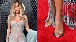 Karol G Brings the Clear Shoe Trend to the Grammys 2026 Red Carpet