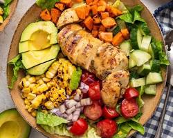 Image of healthy fast food meal with grilled chicken and salad