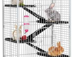 ferret cage with multiple levels, hammocks, and toysの画像