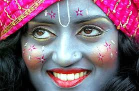 A girl dressed as Lord Krishna takes part in the Hare Krishna Rath Yatra Chariot Carnival in London on Sunday. The traditional Jagannath Rath Yatra is a ... - w3