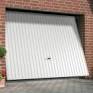 Installer une porte de garage sectionnelle (Castorama) -