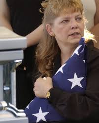 Pain Beyond Your Prayers - mother-with-flag