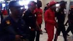 VIDEO-EFF back protest outside H&M