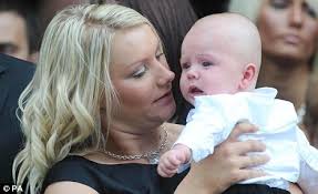 Joanne McAleese holds five-month-old son Charley. Comforting each other: Sjt Paul McAleese&#39;s widow Joanne cuddles their baby son Charley yesterday. - article-1213413-066E6D4E000005DC-850_468x286