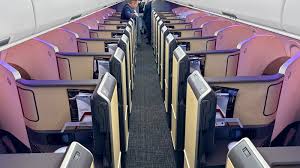 American tightens upgrade policy on certain domestic routes