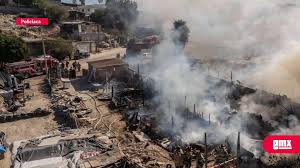Incendio en vivienda y taller mecánico de la colonia Los Reyes deja a un hombre con quemaduras