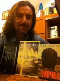 Paul Griffin with three of his favorite books: I Hunt Killers by Barry Lyga, Every Day by David Levithan and Tyrell by Coe Booth - paul-griffin