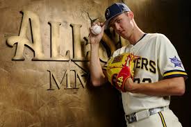 Brewers pitcher Jacob Misiorowski shows off All-Star Game glove with Charizard Pokémon card inside