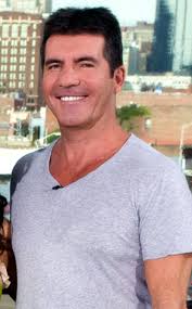 Was Idol Saving Up Paula Cash for Simon? - 293.cowell.simon.042809