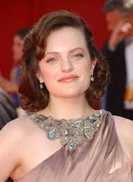Elizabeth Moss&#39; curly bob is the perfect choice for a romantic date. Steal her style: 1. Right when you get out of the shower, part your hair to the side. - elizabeth-moss-short-bob-curly-brunette
