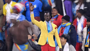 Why Does 'Lumumba Vea,' DR Congo's 'Statue Man,' Stand The Whole Match?