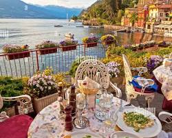 beautifully set table in an Italian restaurant with a panoramic viewの画像
