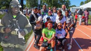 Runners gather for remembrance during the 9/11 Heroes Run in Pennsauken, 
New Jersey