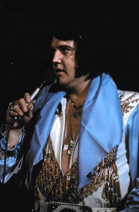 Elvis Presley's tradition of handing out scarves to fans
