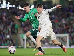 Trai Hume's 'heads held high' message after Northern Ireland's narrow defeat to Germany