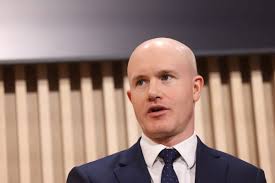 Coinbase to Cut 14% of Workforce, Citing Volatile Markets and AI