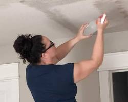 Dust-controlled sanding and surface prep on a residential ceiling