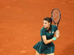Madrid Open: Cirstea's Survival, Gauff's Challenge, and Sinner's Dominance