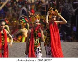 Image of traditional Javanese carnival with dancers and performers in colorful costumes