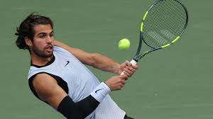 Tennis players competing during a US Open match