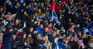 Time to cap costs for football fans