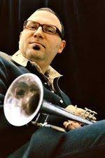 Udo Moll, trumpet player of the &quot;Schäl Sick Brass Band&quot; - a group that ... - Udo-Moll