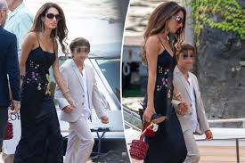 Amal Clooney dazzles in vintage John Galliano for dinner with George and kids in Lake Como