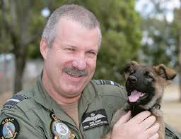 THAT&#39;S MY BOY: ACAUST AVM John Quaife is proud as punch of his new MWD foster puppy, &#39;JQ&#39;, who was named after him. Photo by LAC Scott Woodward - 07-Quiafe