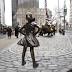 'Fearless Girl' statue stares down bronze Wall Street bull