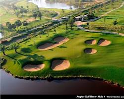 Lush green fairway at Angkor Golf Resort in Cambodia
